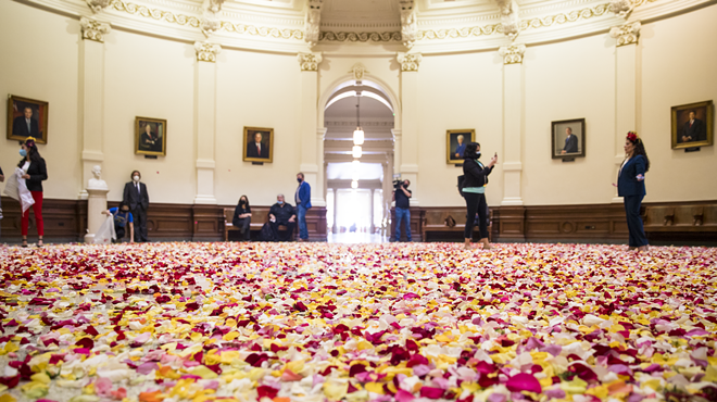 Young voting-rights activists dumped thousands of multicolored rose petals into the Capitol rotunda Thursday.