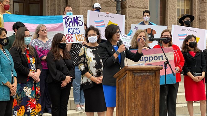 LGBTQ+ advocates speak out against bills targeting transgender children at a rally last spring at the Texas Capitol.