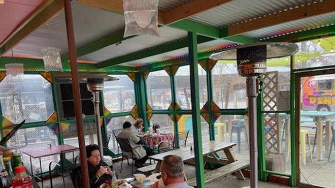 Customers dine in the enclosed portion of Lala's Gorditas.