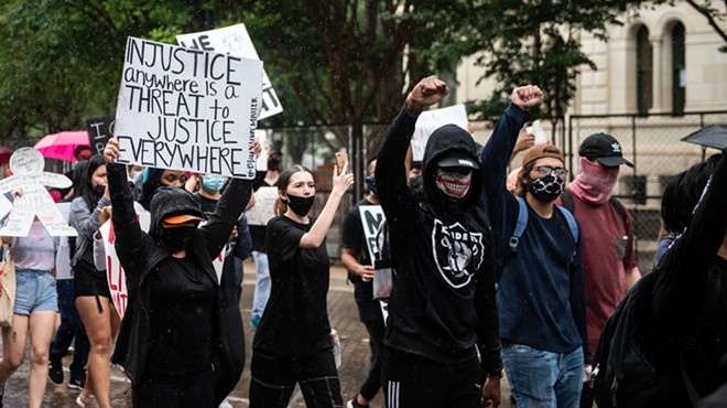 Protesters march at a recent San Antonio anti-police brutality demonstration.