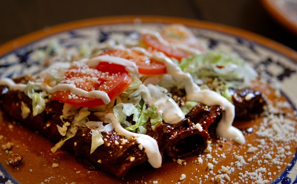 Maíz's Enchiladas Maria features cortina cheese and mole sauce.