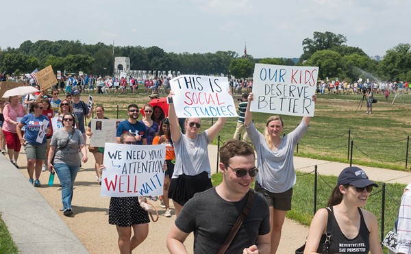 Teachers attend a protest march against the expansion of school vouchers.