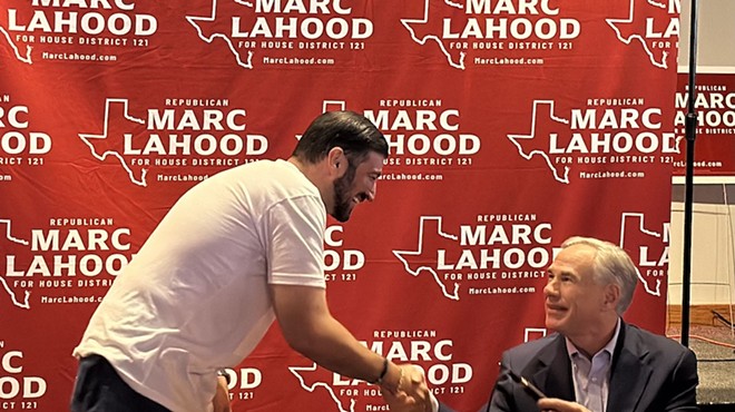 Texas House District 121 candidate Marc LaHood shakes hands with Gov. Greg Abbott during a campaign event in late February.