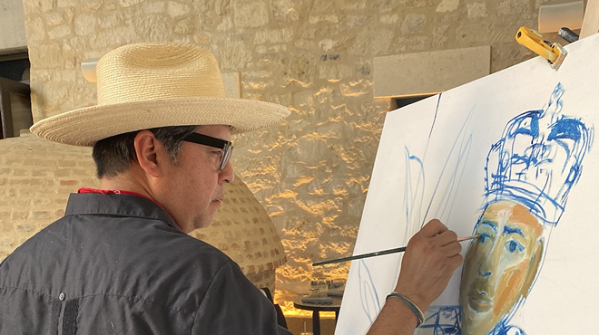 Cruz Ortiz paints 2021 Rey Feo Thomas Aguillon.
