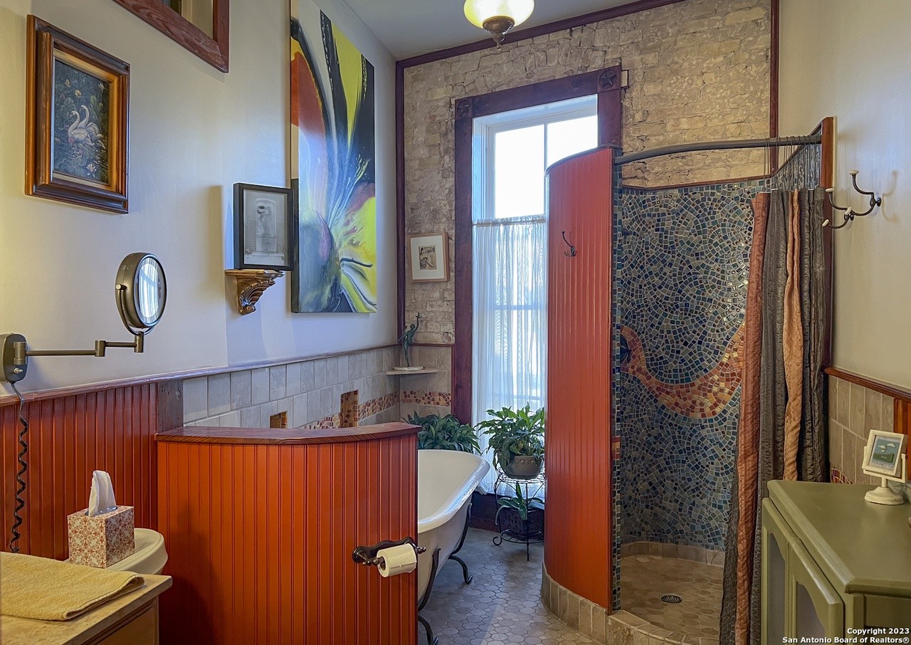 Renowned San Antonio photographer Al Rendon is selling his 1892 studio and living space