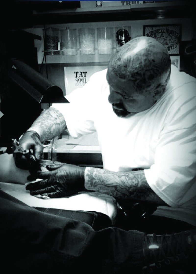 Revolution Ink tattoo artist Pikaso Soliz. - Courtesy