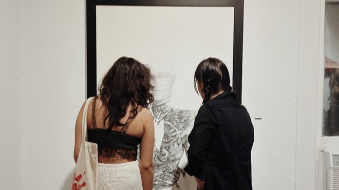 Visitors to Sala Diaz look at work during the gallery's Kim Bishop exhibition.
