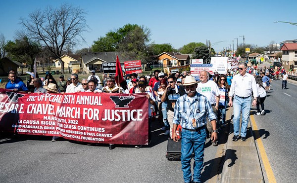Participants in the 2022 Cesar E. Chavez March for Justice make their way along the route.