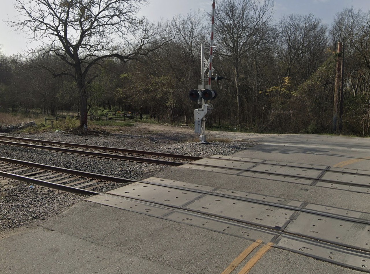 The Ghost Tracks
You can’t talk about urban legends in San Antonio without covering the Ghost Tracks. This long-dispelled myth is still a local favorite, and has repeatedly been voted Best Urban Legend in the Current’s Best of San Antonio poll. As the story goes, you can park your car at this spot on the train tracks and get “pushed” forward by some spectral helpers. As a bonus, if you put flour on the back of your trunk, you might even see their little handprints. The push purportedly comes from ghosts of children who met an untimely end in the early 1900s when a train rammed into a bus at the location. However, in 2003, archivist Matt DeWaelsche traced the story's origin to a 1938 bus accident in Salt Lake City, Utah. Even worse, the tracks were "exorcised," if you will, by a construction project. When Union Pacific added a second track to the intersection, they leveled out the elevation, removing the downward slant that vehicles would gently roll down when they were supposedly being "pushed" by the ghosts. Turns out it was just a trick of physics the whole time.