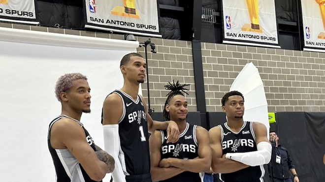 From left to right, San Antonio Spurs Jeremy Sochan, Victor Wembanyama, Devin Vassell and Keldon Johnson pose for reporters at the team's recent media day.