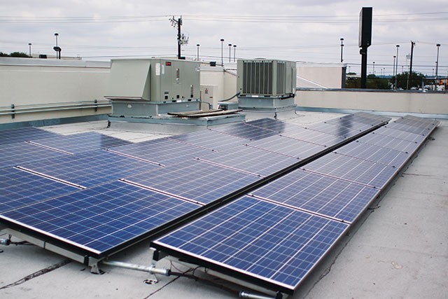 Solar panels on Hill Electric Co.'s rooftop