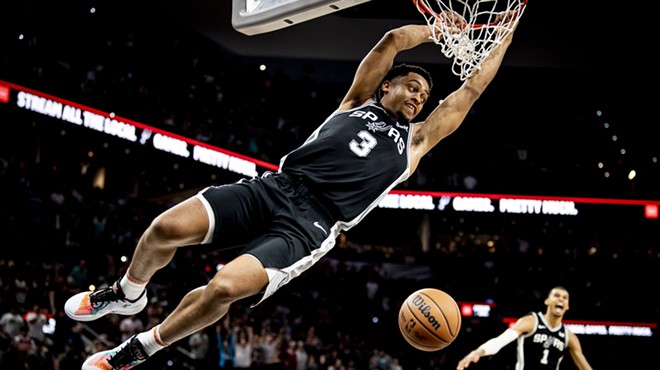 San Antonio Spurs power forward Keldon Johnson throws down a dunk.