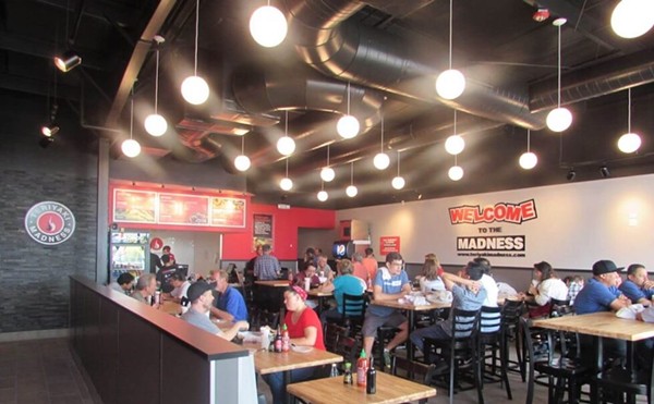 Customers dine inside a Teriyaki Madness location.