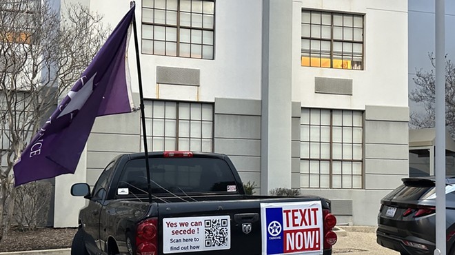 A pickup emblazoned with pro-TEXIT insignia is parks outside a TNM meeting in San Antonio earlier this year.