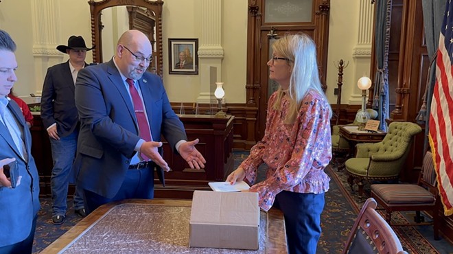 Texas Nationalist Movement President Daniel Miller delivers a petition to Gov. Greg Abbott's office calling for the state to secede from the union.
