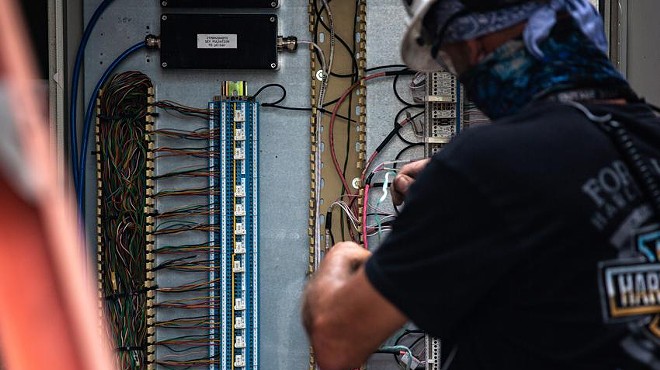 A power plant employee adjusts the wiring of a power unit in North Texas. The Texas energy sector has been increasingly probed for weaknesses by computer hackers from Russia, according to a cybersecurity expert whose company has monitored cyber threats in Texas.