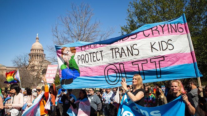 People gathered outside the Governor’s Mansion in Austin on March 13 to protest Gov. Greg Abbott’s directive to investigate families providing gender-affirming care to their children.