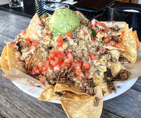 Brisket nachos from The Pigpen
106 Pershing Ave, (210) 267-9136, thepigpensa.com
Sure, there’s some super cheesy picks on the Pigpen menu, but your best bet is the brisket nachos. Chips are piled with brisket (obviously), pico de gallo, guacamole and melted queso. While the cheese isn’t the standout here, the mixtures of flavors is a good example of how you can cheese is sometimes best enjoyed with other flavors.Oh, and if you’re there during Sunday brunch, be sure to stock up on the cheese grits.
Photo via Instagram / hereforthefoodie