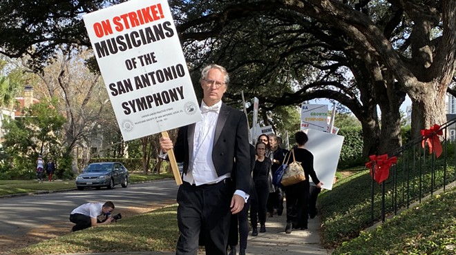 Musicians from the San Antonio Symphony picket the home of Kathleen Weir Vale, the organization’s chair. They staged the protest in late December.