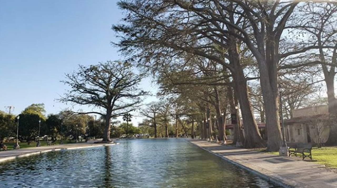 San Pedro Springs Park
2200 N Flores St, (210) 732-5992, sanantonio.gov
Spend some time at San Pedro Springs Park and you’ll be kicking back at the second oldest park in the U.S. And it’s super badass at that! Here visitors are able to spend time outdoors and experience the beauty of the park. While enjoying the scenery is always an option with a stroll around the park, warmer weather calls for a dip in the pool. The springs and creek have attracted visitors for the last 12,000 years, in historic times for water, food and as a place to set up camp. Be sure to do your homework and read up on the history of the park to properly appreciate this landmark.
Photo via Instagram / joseangel_siller