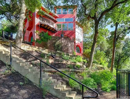 The "Red House on the River" —&nbsp;a landmark for Guadalupe River tubers — is up for sale