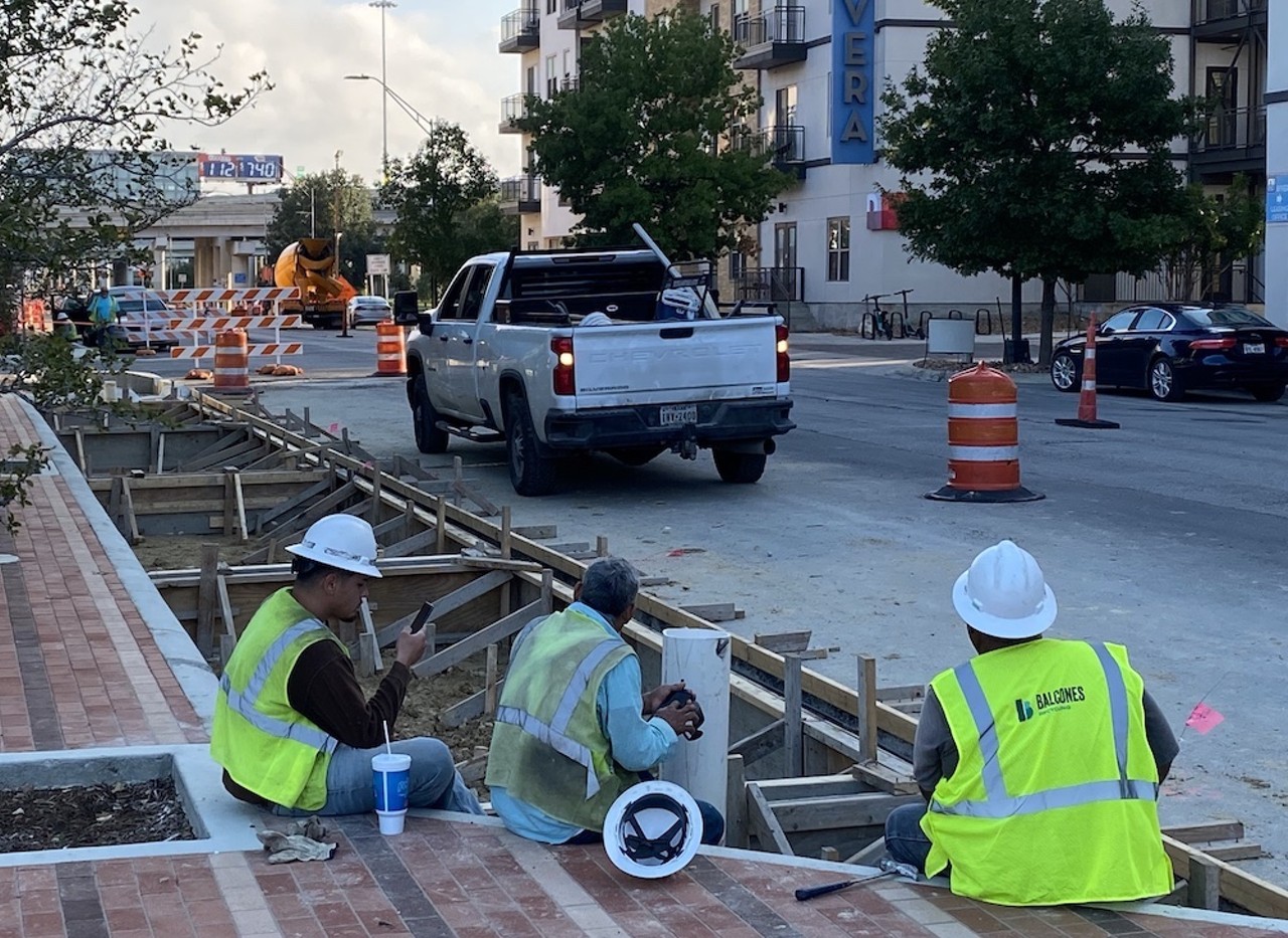 Broadway North of Downtown: A giant hole in the pavement with guys in hard hats standing or sitting around it.
Anybody remember when this was a drivable stretch of road?