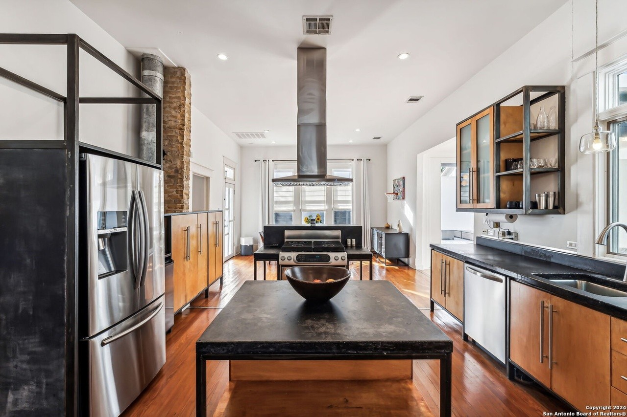 This 1920s King William bungalow has a staircase made out of vintage railroad tracks