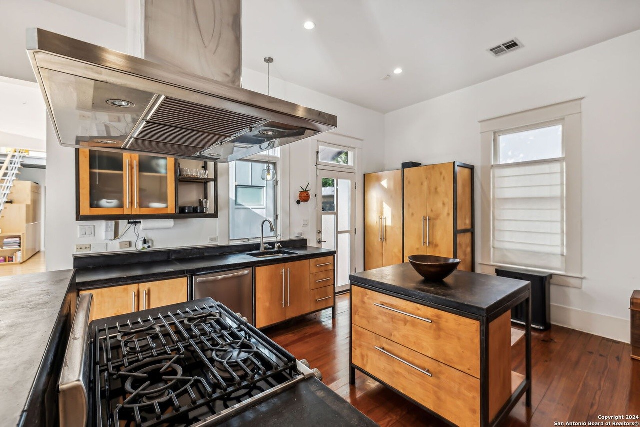 This 1920s King William bungalow has a staircase made out of vintage railroad tracks