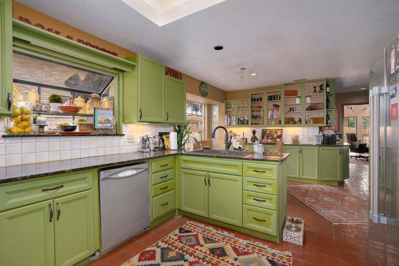 This Brady Bunch-style house in San Antonio actually comes with a wildly colorful interior
