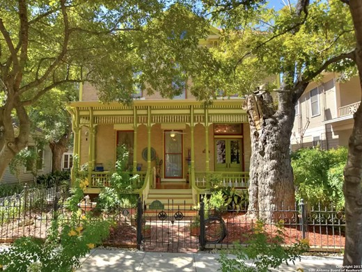 This historic San Antonio home is for sale, and it comes with the Yellow Rose Bed and Breakfast