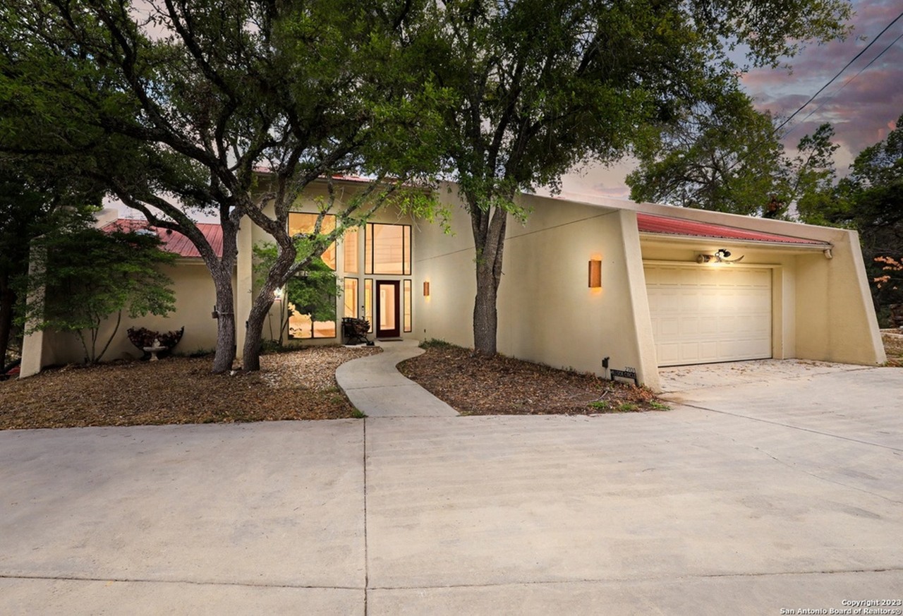 This quirky, artist-built house in New Braunfels comes with a pond and nature paths