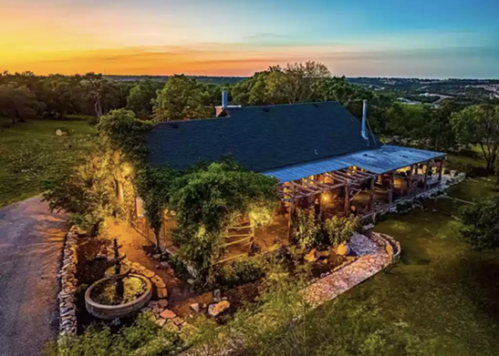This San Antonio-area house for sale has timber columns reclaimed from an old Tennessee barn
