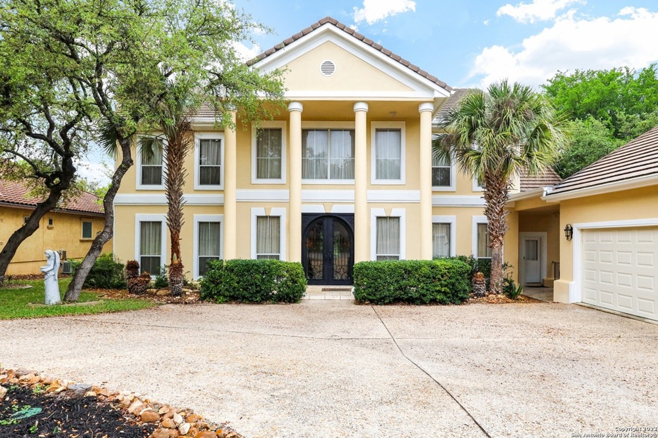 This San Antonio home far sale has dual grand staircases and a private movie theater