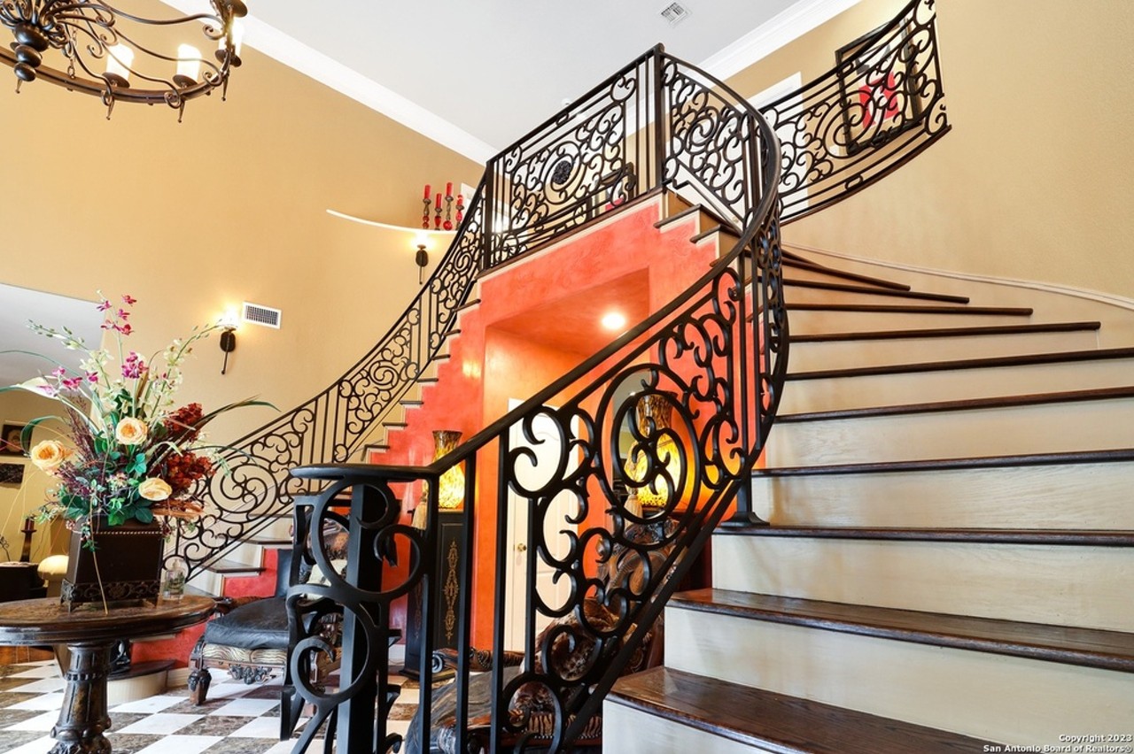 This San Antonio home far sale has dual grand staircases and a private movie theater