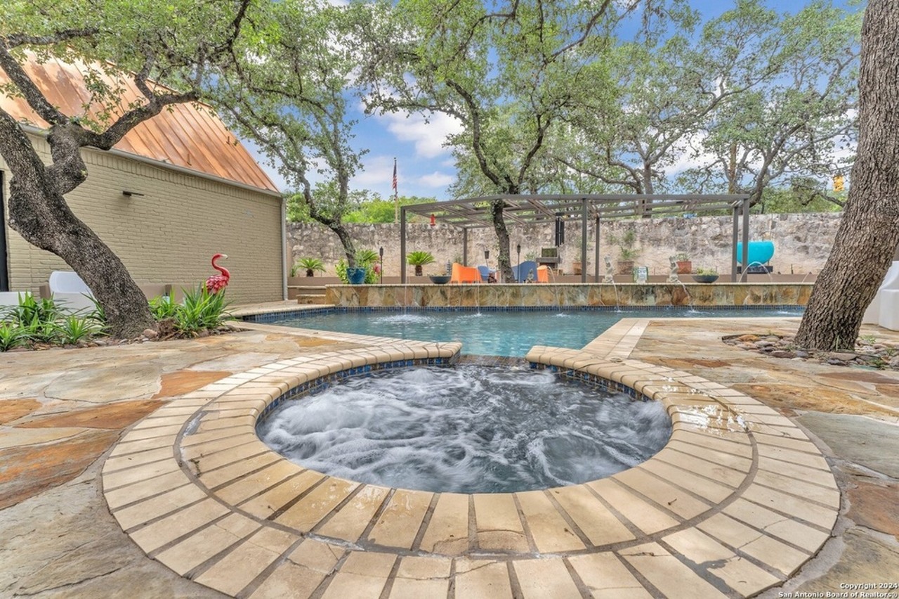 This San Antonio home for sale comes with 20-foot ceilings and a remote-controlled pool