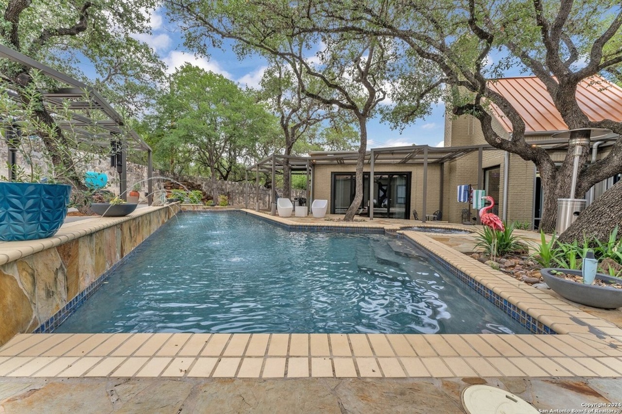 This San Antonio home for sale comes with 20-foot ceilings and a remote-controlled pool