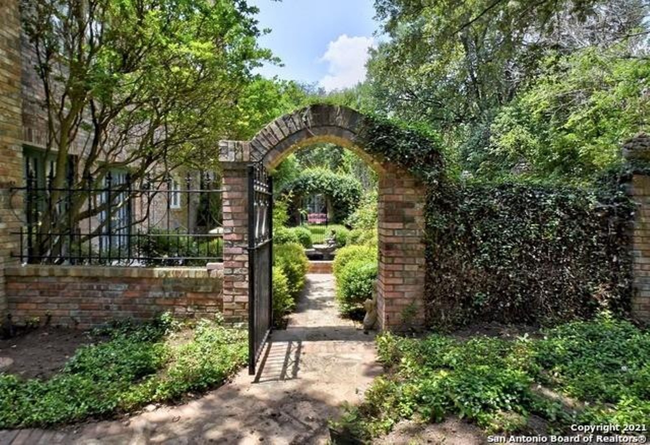 This San Antonio home modeled after a British estate includes an on-site pub and UK phone booth