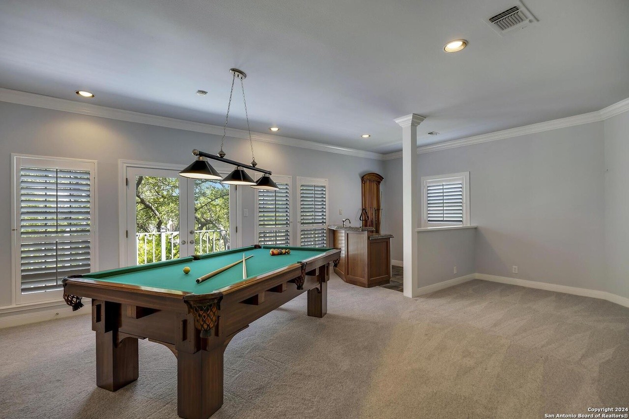 This San Antonio mansion for sale comes with a 63-foot-long indoor lap pool