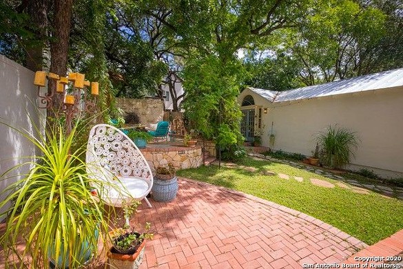 This Spanish-Style Home for Sale Has the Coolest Backyard Chill-Out Space in San Antonio