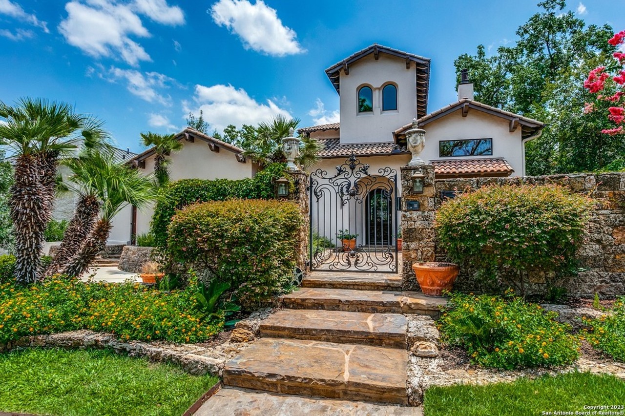 This Spanish-style San Antonio home for sale has a hidden backyard oasis