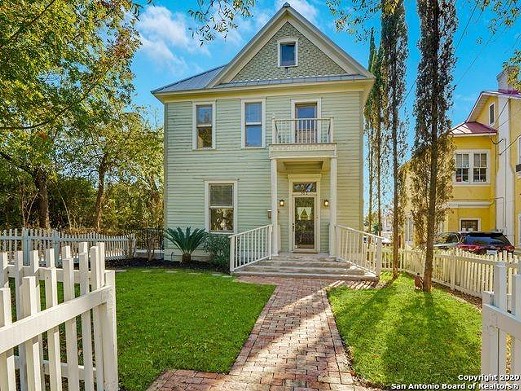 This two-story home for sale in San Antonio's Monte Vista neighborhood is a 1901 charmer
