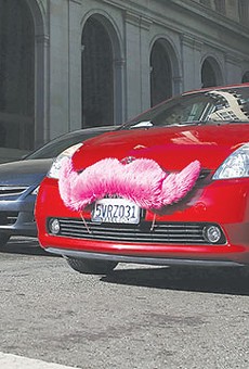 This vehicle’s fuzzy pink mustache represents Lyft