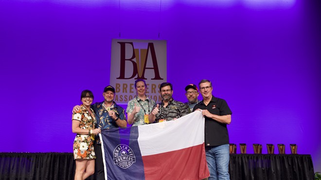 The Longtab Brewing Co. crew shows off its excitement after winning gold in the American-Belgo-Style Ale category.