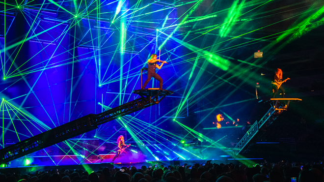 Nothing says "Christmas" quite like lasers and musicians on platforms raised above the crowd.