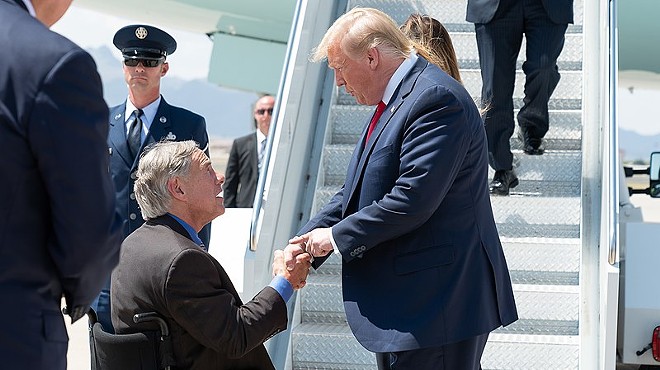 Gov. Greg Abbott greets Donald Trump during one of the president's 2019 Texas visits.