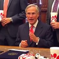 Subtle He Ain't: Texas Governor Signs So-Called 'Save Chick-fil-A' Bill While Surrounded by People Holding Chick-fil-A Cups