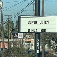 San Antonio chef Andrew Weissman's Mr. Juicy expertly trolls rival burger joint with road sign