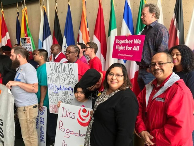 Workers and activists at a recent AFL-CIO Texas rally show their support for mandated paid sick leave. - PHOTO COURTESY OF AFL-CIO WEBSITE