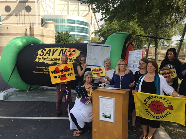 Environmental activists speak out against a plan to ship nuclear waste via Texas railways during a press conference in front of the Alamodome. - SANFORD NOWLIN