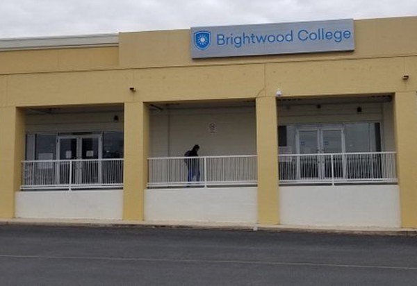 A person leaves one of San Antonio's two shuttered Brightwood campuses. - TWITTER / KSATNEWS
